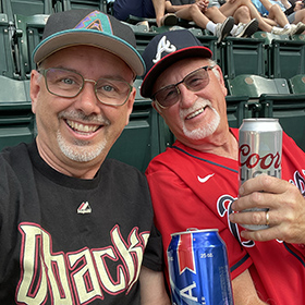 Mark and Curt Greenawalt drinking beer at the Arizona Diamondbacks game on my birthday.